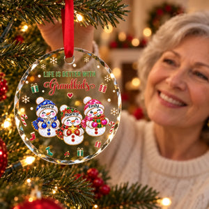 Grandkids Make Christmas Better glass ornament on the tree
