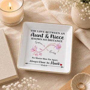 The Love Between An Aunt And Niece Birth Month Flowers Infinity - Personalized Custom Jewelry Dish, Square Ceramic Dish - AUNT031_SCRD