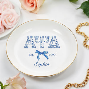 Alpha Psi Delta Est, Floral Greek Letters And Bow Ceramic Dish - Personalized Custom Jewelry Dish, Ceramic Dish, Round Shape - GRAD474_RCRF