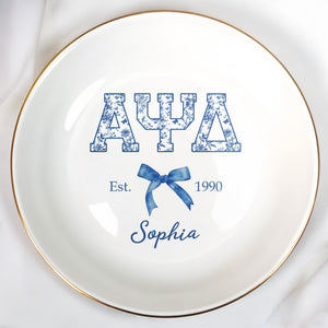 Alpha Psi Delta Est, Floral Greek Letters And Bow Ceramic Dish - Personalized Custom Jewelry Dish, Ceramic Dish, Round Shape - GRAD474_RCRF