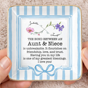 The Bond Between An Aunt & Niece, Flowers & Ribbon Decor - Personalized Custom Jewelry Dish, Ceramic Dish, Square Shape - NCE026_SCRF