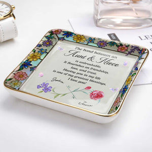 The Bond Between An Aunt And Niece Unbreakable With Birth Month Flowers - Personalized Custom Jewelry Dish, Ceramic Dish, Square Shape - NCE060_SCRF