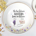 The Love Between Sisters Knows No Distance Floral Map Shapes - Personalized Custom Jewelry Dish, Ceramic Dish, Round Shape - SIS047_RCRF