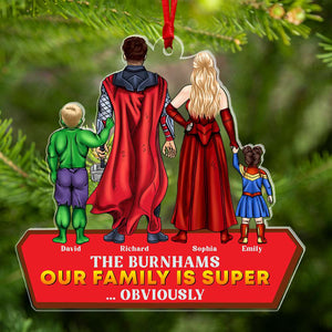 Our Family Is Super Obviously personalized acrylic ornament — hanging on a tree
