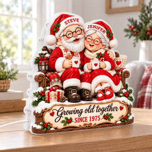 Santa Couple Growing Old Together light box on a table